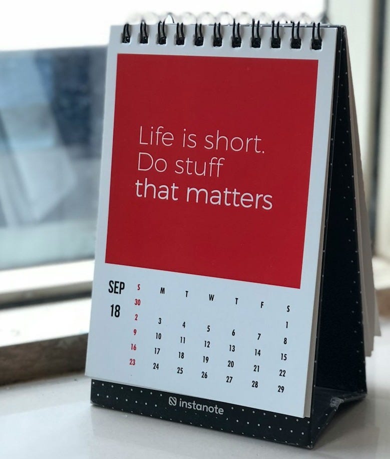 spiral freestanding calendar on white surface spiral freestanding calendar on white surface