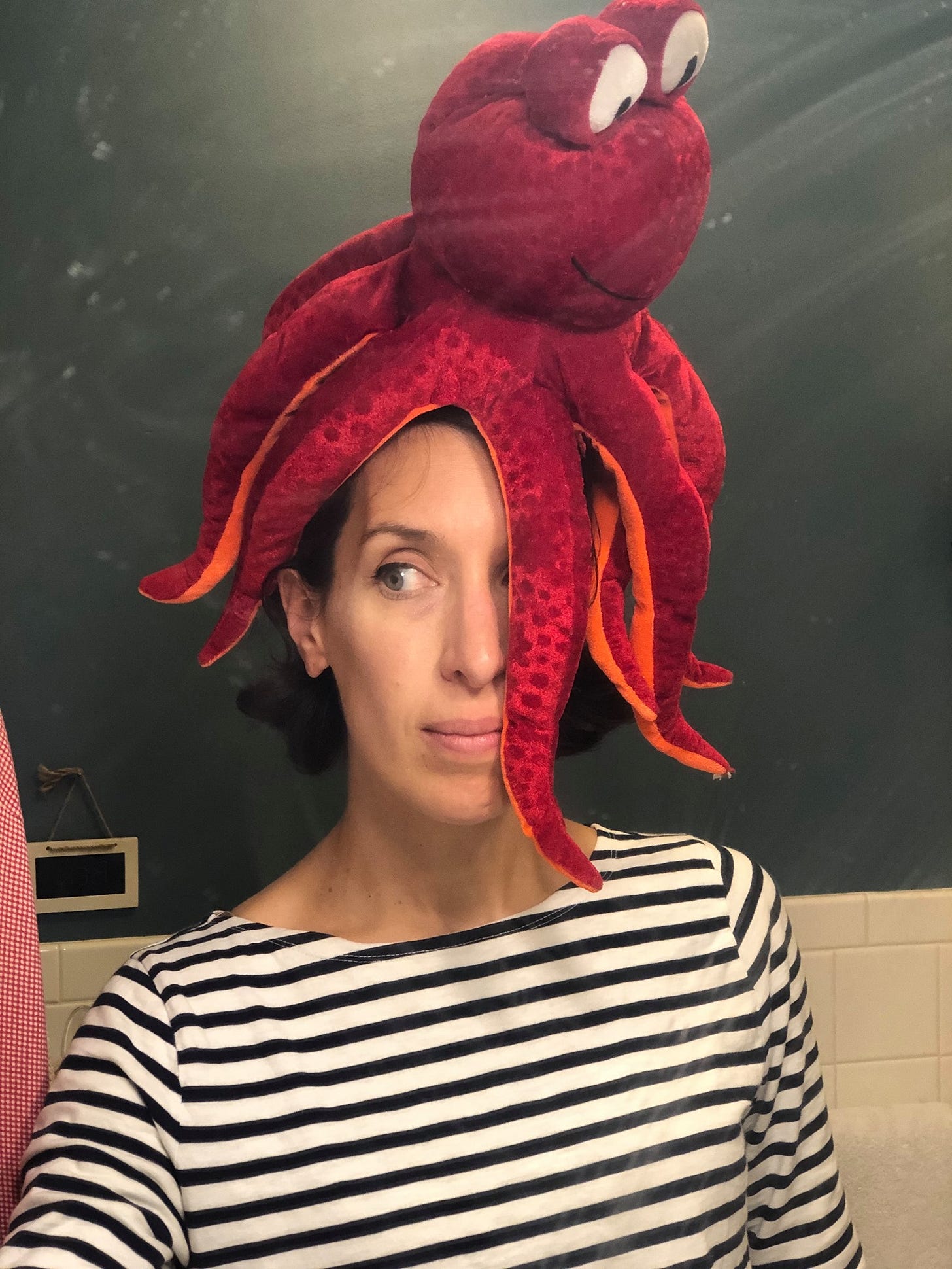 Raquel with some kind of cephalopod on her head