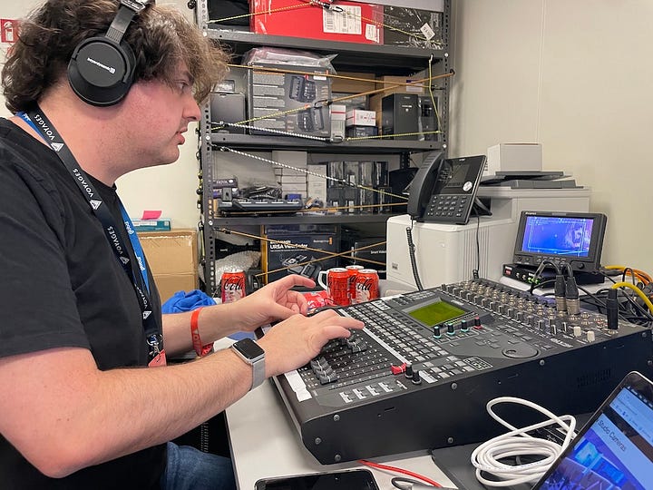 1st photo, me sat at an audio mixing desk in the ship's technology office. 2nd: Selfie on the deck in front of the Virgin logo on the chimney. 3rd: On my knees installing cabling in an access panel. 4th: Standing out on the open shell door at the starboard bow. I'm wearing life jacket and harnesses.