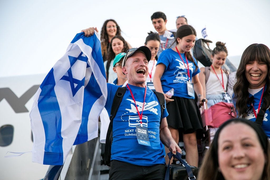 May be an image of one or more people and text