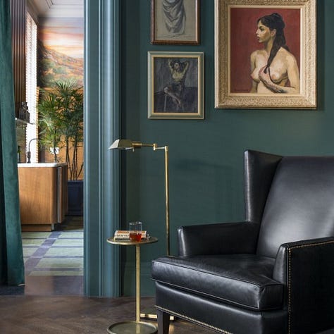 pictures of a beautiful lounge with artistic seating and paintings