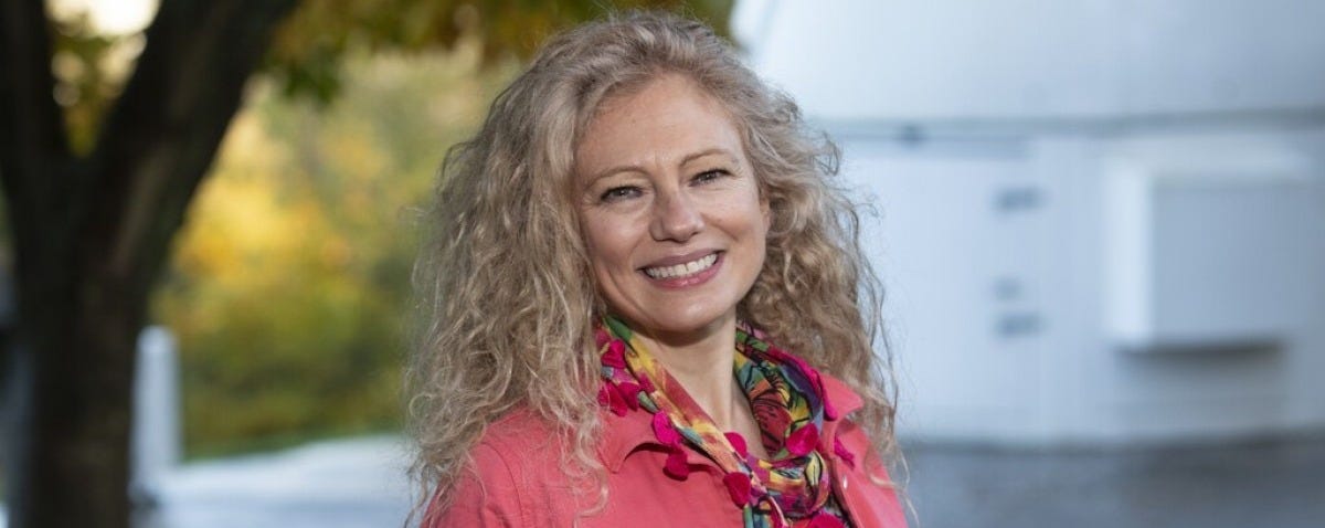 Dr Noelia Noel near a space observatory