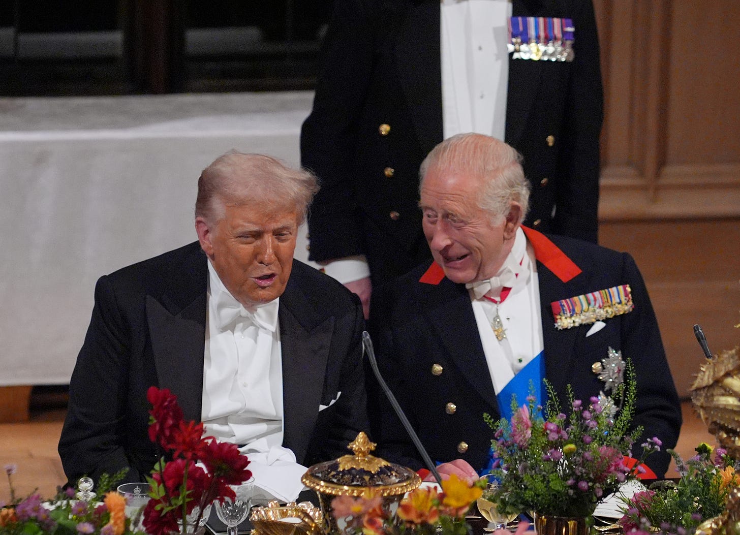 King Charles sat next to Donald Trump at the State Banquet laughing at a remark he made