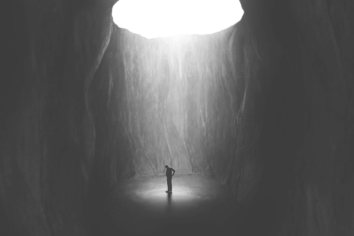 Figure Stuck in Dungeon with Light Above Figure Stuck in Dungeon with Light Above