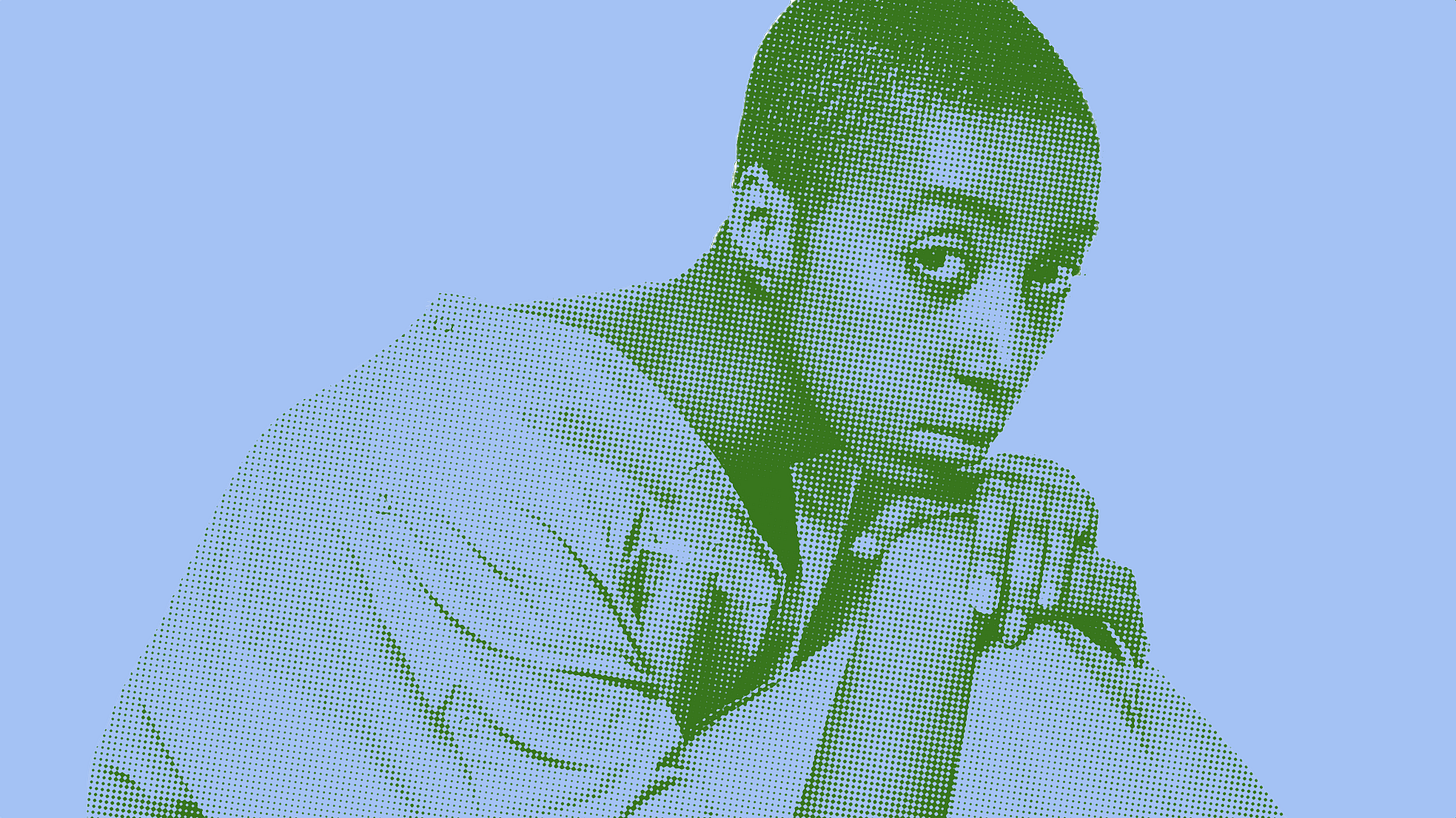 A stylized image of a short-haired Black person in a prison jumpsuit, kneeling and looking at the camera with a sullen expression.
