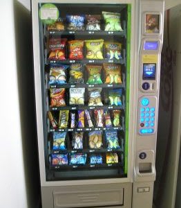 A vending machine full of snack items