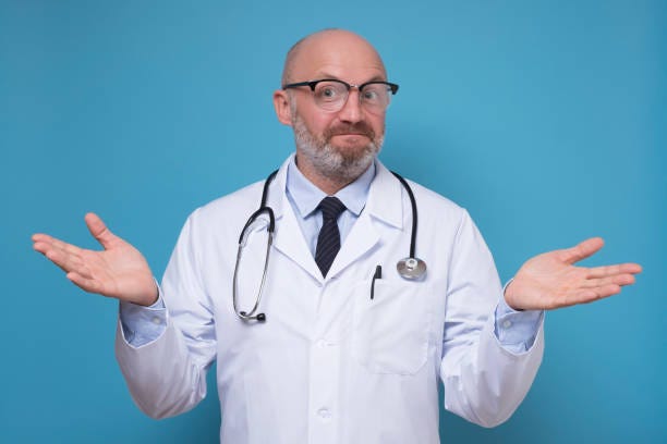 390+ Doctor Shrugging Shoulders Stock Photos, Pictures & Royalty-Free ...