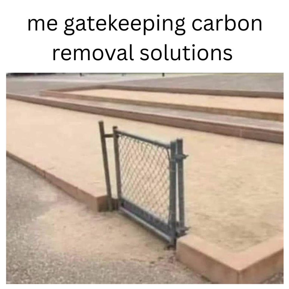 "me gatekeeping carbon removal solutions" above a photo of a small chain-link gate standing on its own in an open sandy area, with no fence on either side.