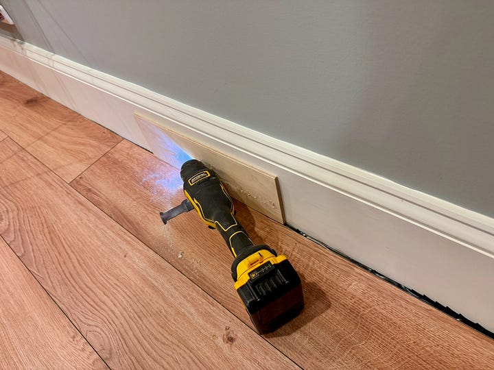 On the left, a DeWalt multitool sits on LVP. On the right, a close-up of shoe molding and a threshold finishing the edges on LVP.