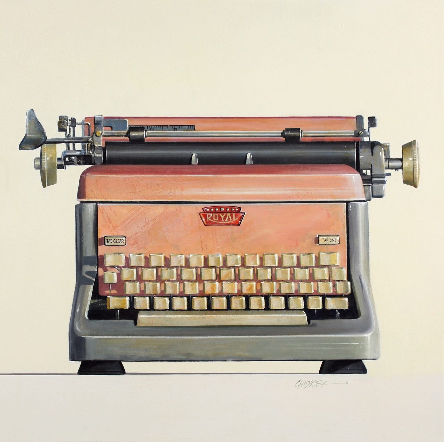 A pink and silver typewriter

Description automatically generated