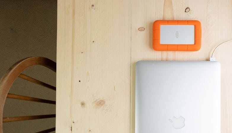 white ipad on white table