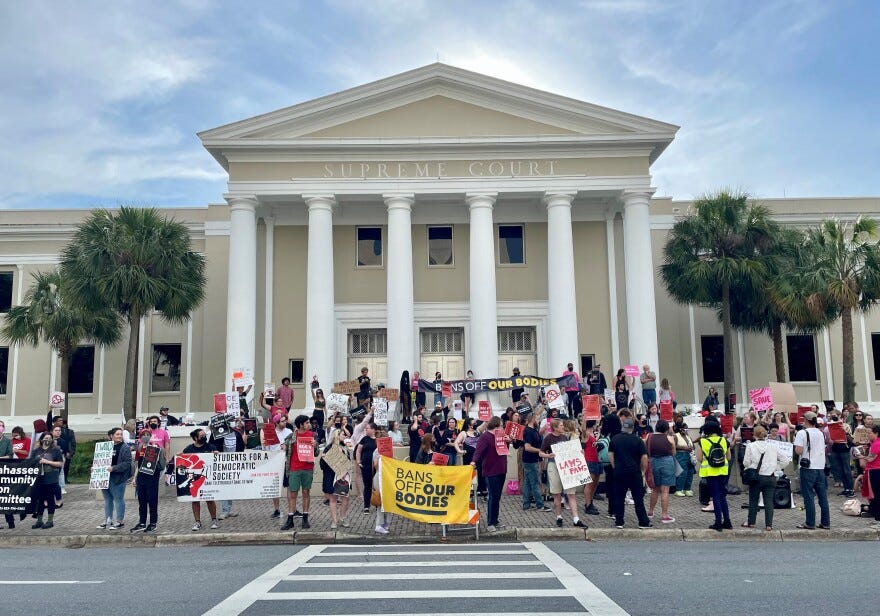 Abortion rights advocates rallied in front of the state Supreme Court after the leaked draft opinion from the U.S. Supreme Court.