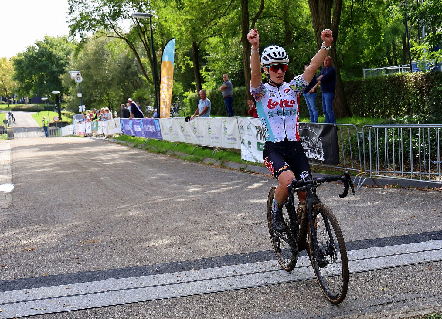 May be an image of 5 people, bicycle and text