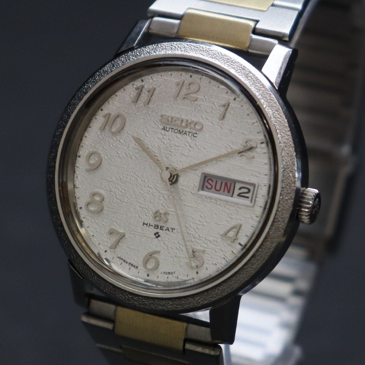Rare All Numbers 56GS GRAND SEIKO Grand Seiko High Beat Automatic Winding 5646-7040 Hammered Bezel GS Medallion 1973 Suwa Japanese-English Day Date Men's