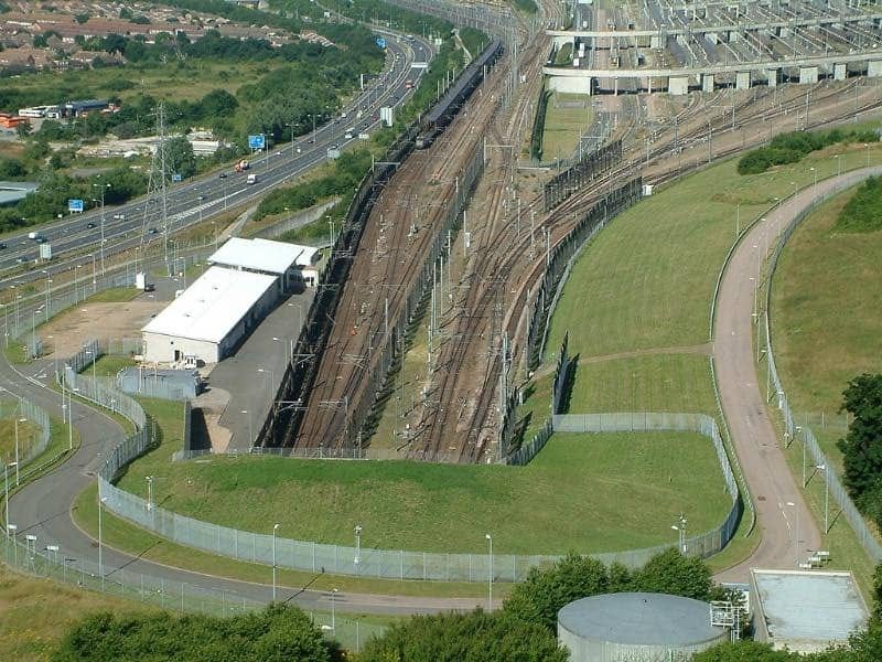This image shows a view overlooking the tunnel entrance at Folkestone, leading to Coquelles, near Calais.