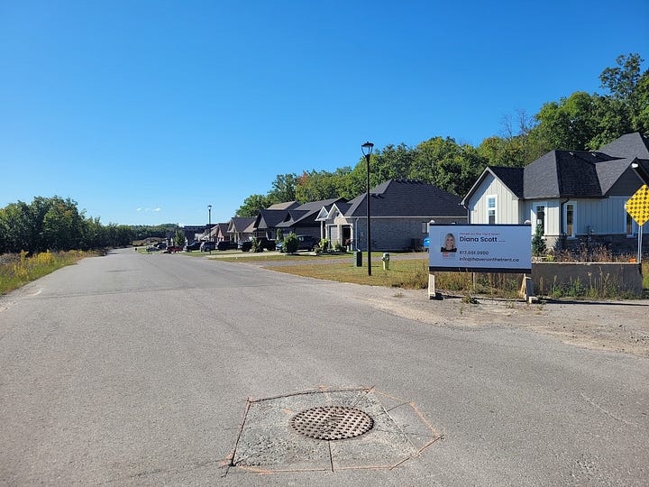 Existing homes on the west side of Riverside Trail. The route up the hill to an eventual phase 6