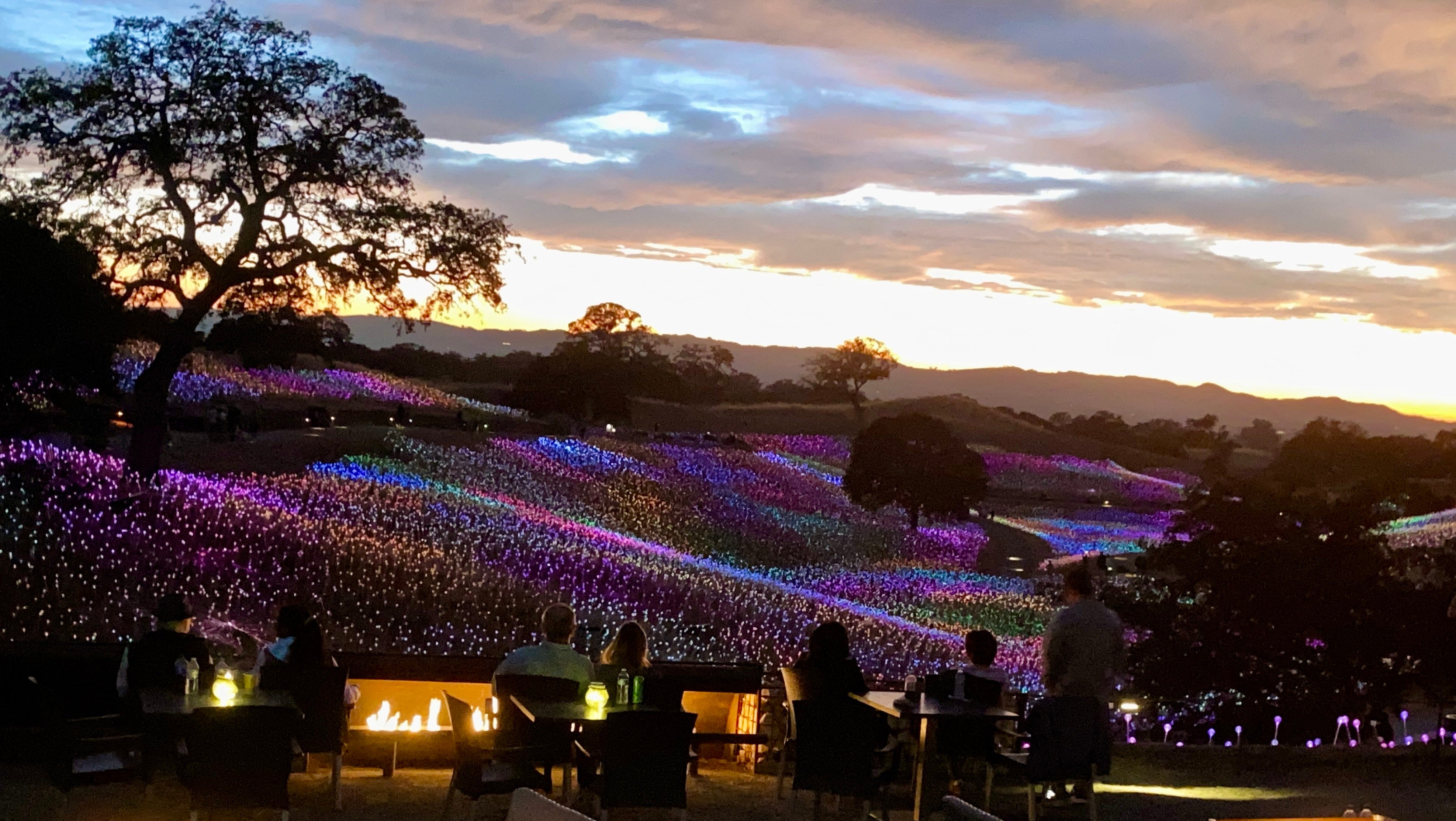 The hills as they alight into a rainbow of colors as darkness descends at Sensorio. The hills as they alight into a rainbow of colors as darkness descends at Sensorio.