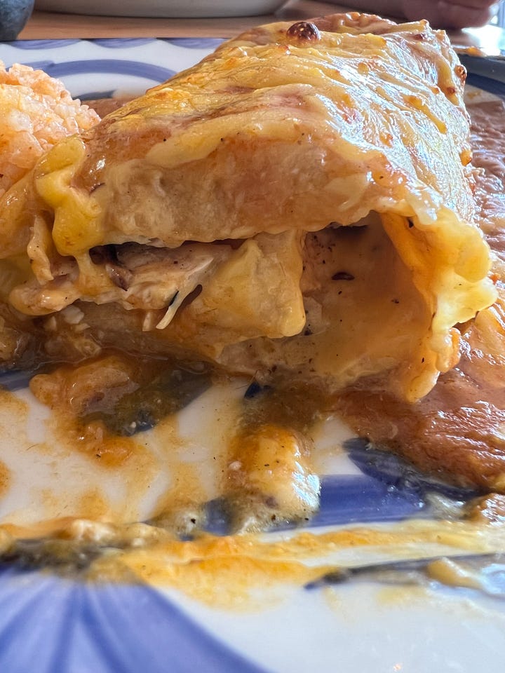 Enchiladas, chimichanga, and street corn at Frida’s