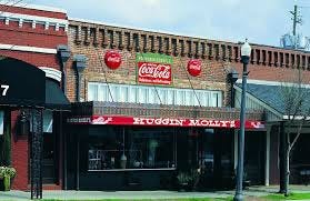 Huggin' Molly's is a wonderful old-timey diner and soda shop in Abbeville,  AL. It's named after a larger-than-life local legend who, according to  lore, hid in the shadows and jumped out and