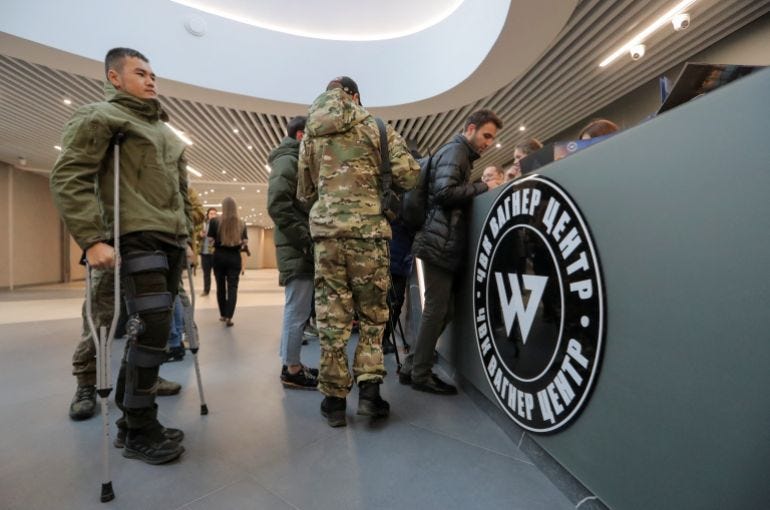 People visit PMC Wagner Centre, which is a project implemented by the businessman and founder of the Wagner private military group Yevgeny Prigozhin, during the official opening of the office block in Saint Petersburg, Russia, November 4, 2022. People visit PMC Wagner Centre, which is a project implemented by the businessman and founder of the Wagner private military group Yevgeny Prigozhin, during the official opening of the office block in Saint Petersburg, Russia, November 4, 2022.