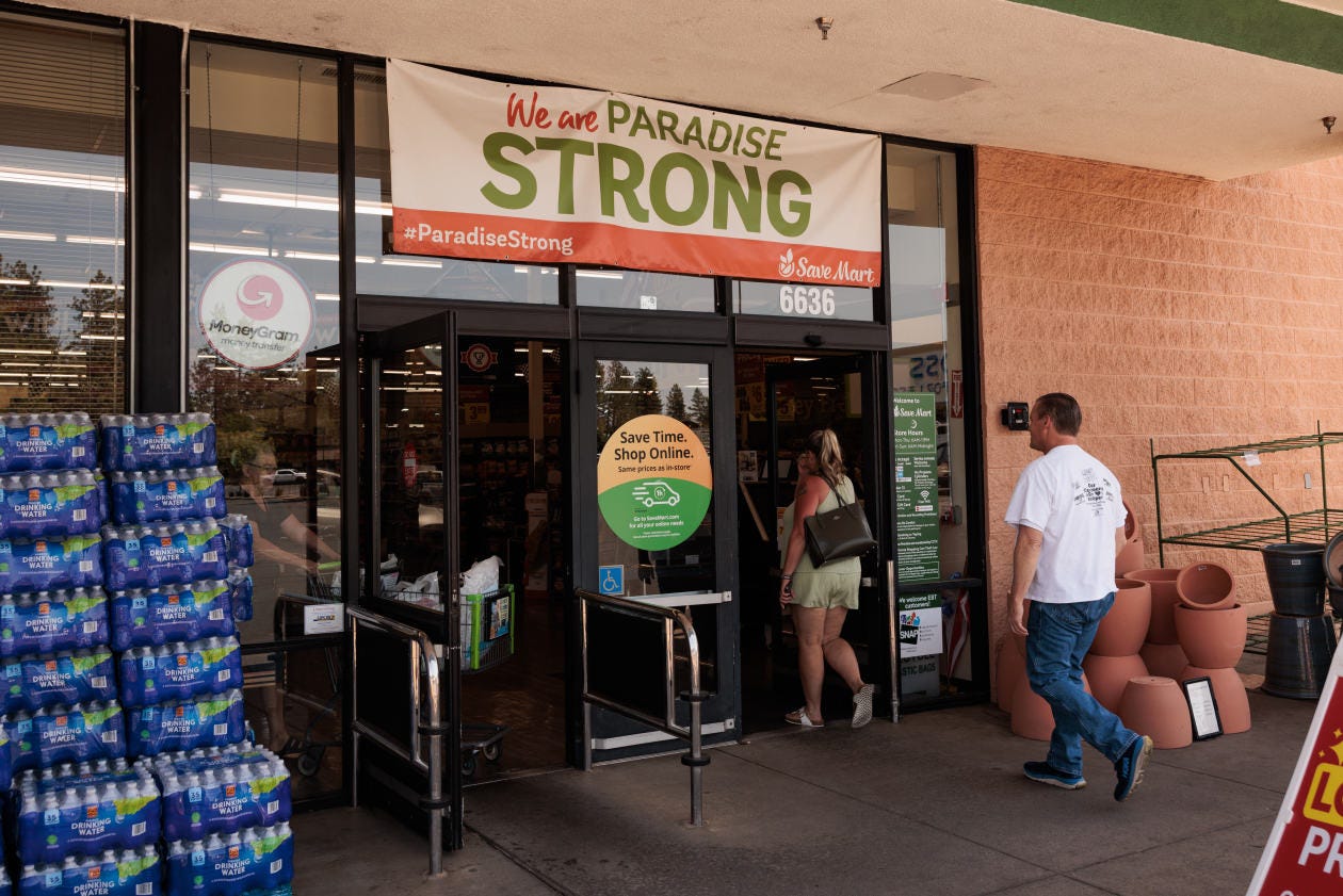 Save Mart grocery store with "We are Paradise Strong" banner.