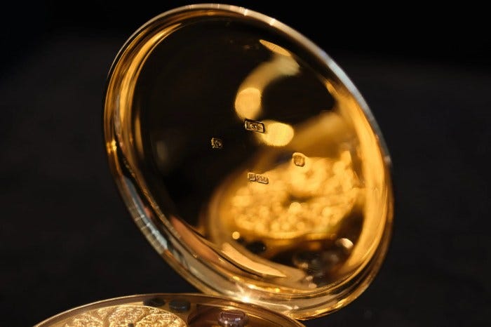 The hallmarks inside the case with a reflection of a decorated barrel in Pocket Watch No. 2. Photo by Troy Barmore. The hallmarks inside the case with a reflection of a decorated barrel in Pocket Watch No. 2. Photo by Troy Barmore.