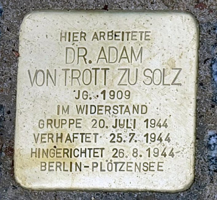A stone with text on it
Description automatically generated A stone with text on it
Description automatically generated
