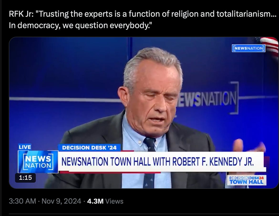 A person in a suit and tie

Description automatically generated