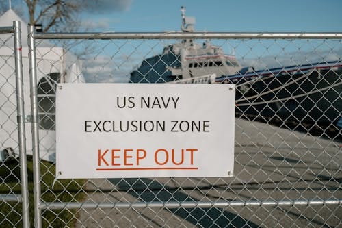 Free US Navy exclusion zone sign with a ship in Milwaukee, emphasizing restricted access. Stock Photo