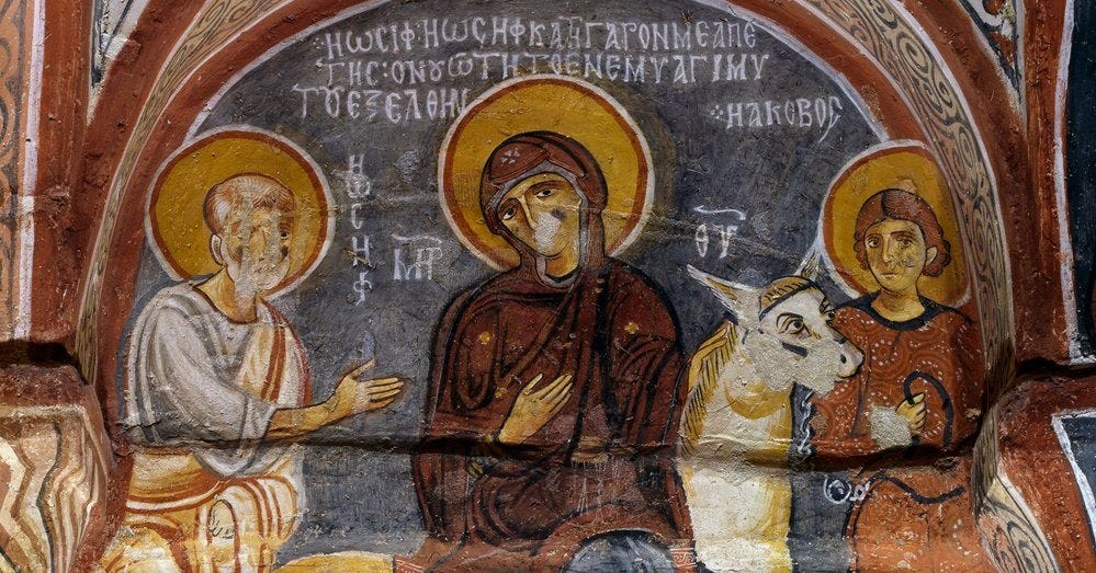 Byzantine fresco of the Flight into Egypt showing St. Joseph leading the Virgin Mary and Christ Child into exile. Joseph walks ahead, bearing the weight of fatherhood in obedience. The image reflects Catholic fatherhood through exile, suffering, and silent spiritual leadership.