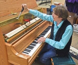 Blaine Lutz tunes a piano at Wachter Middle School in Bismarck on Friday, Oct. 14 2017. Lutz now resides in Congress, Arizona. (Photo courtesy of Tom Stromme, The Bismarck Tribune). Blaine Lutz tunes a piano at Wachter Middle School in Bismarck on Friday, Oct. 14 2017. Lutz now resides in Congress, Arizona. (Photo courtesy of Tom Stromme, The Bismarck Tribune).