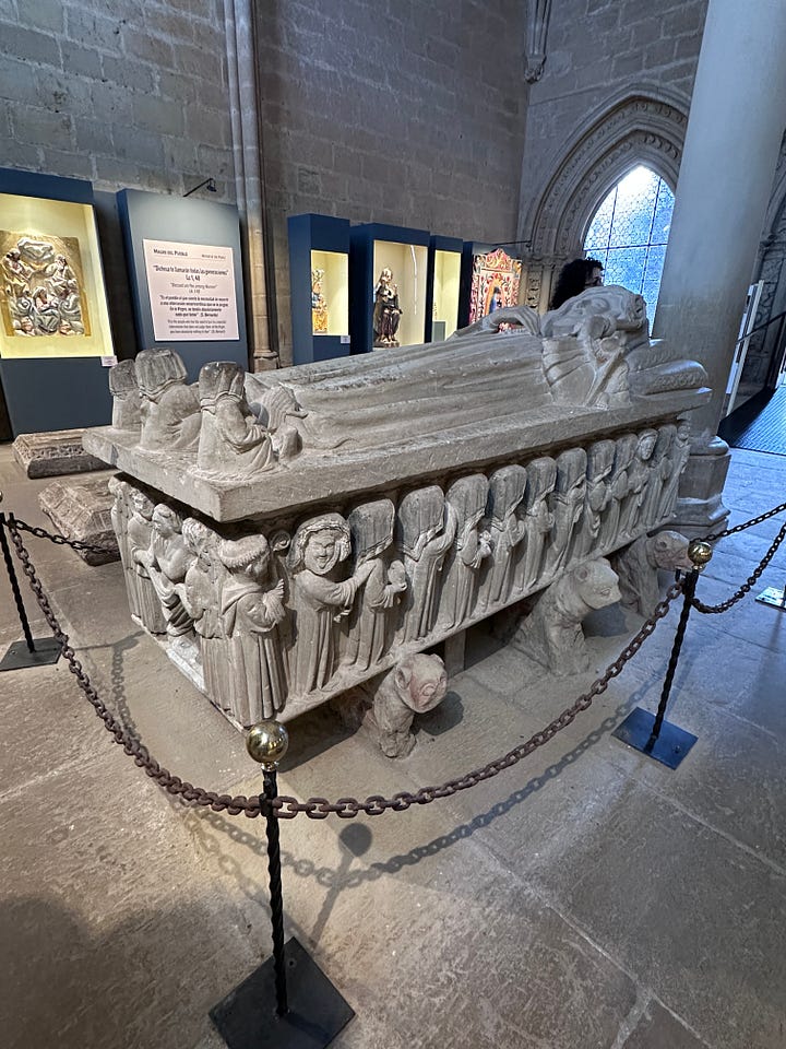 Inside the chapel at the Monasterio de Santa María, Renaissance altarpiece, 15th century Madonna and Child statue, and the tomb of Doña Urraca López de Haro.