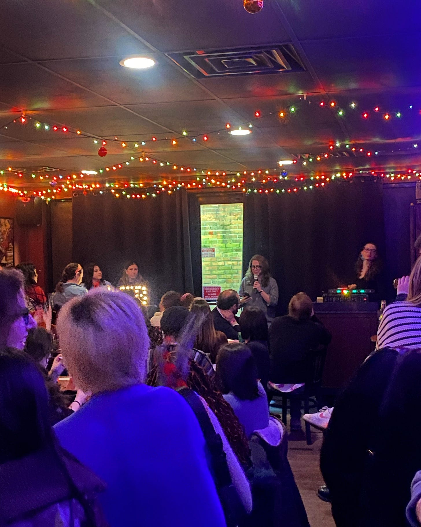 Pam reading her story+backstory at MFB story slam