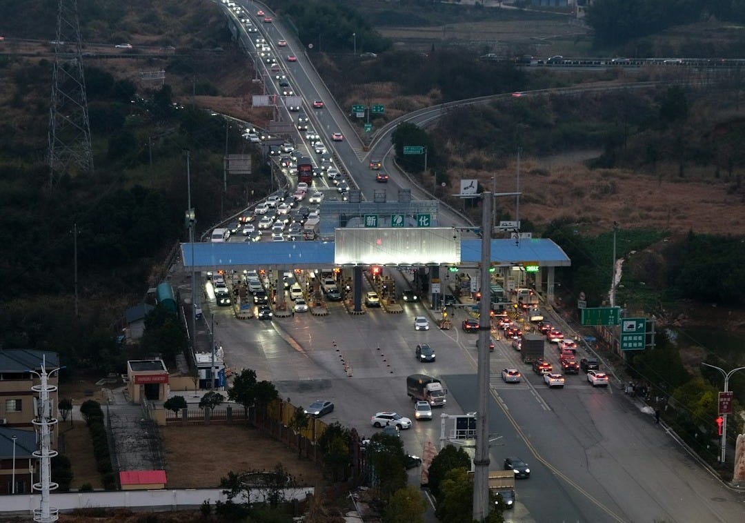 Traffic jam at a toll booth on a highway.