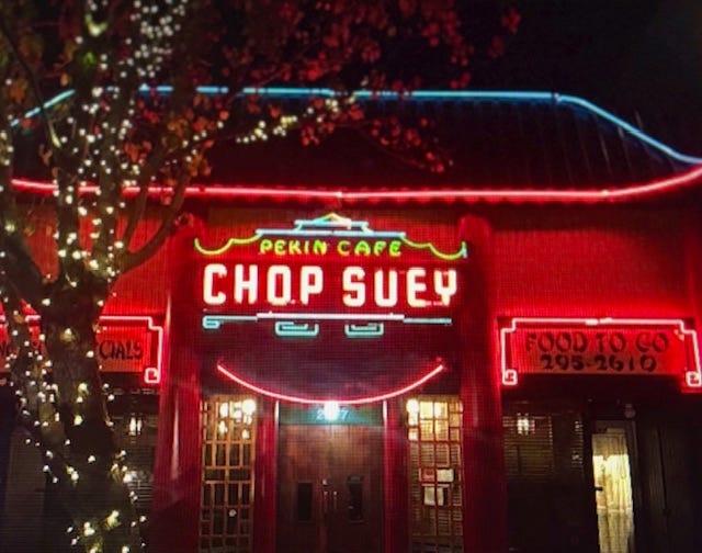 A building with neon lights

AI-generated content may be incorrect.