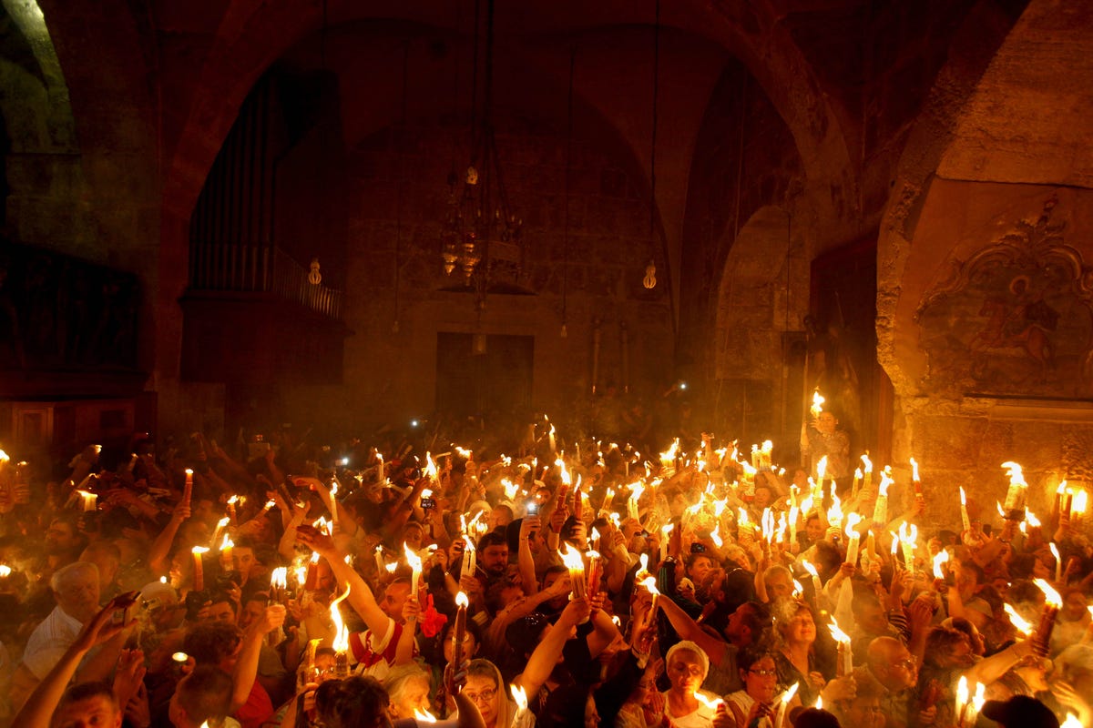 Holy Fire Lights Orthodox Easter In Jerusalem's Church Of The Holy ...