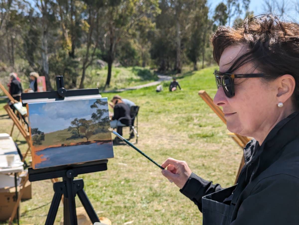 amanda holman painting at the painted river project amanda holman painting at the painted river project