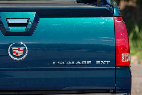 Cadillac Escalade EXT | Photo: Bring a Trailer