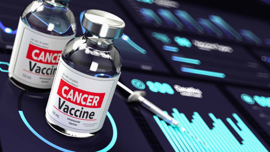 Cancer Vaccine Research Concept Vaccine and Syringe on Graphics. 3D render