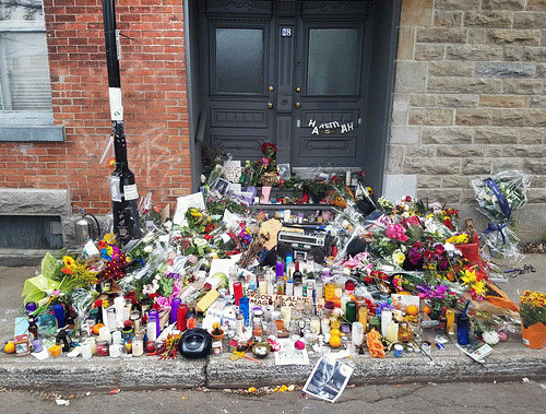 RIP: The women threw back their flowers -- in tribute.