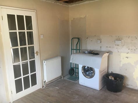 Bare kitchen after all the units have been removed