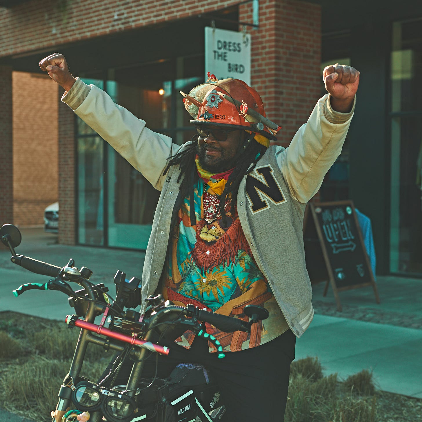 FatbikeHero posing Triumphantly during a live FatbikeHero performance