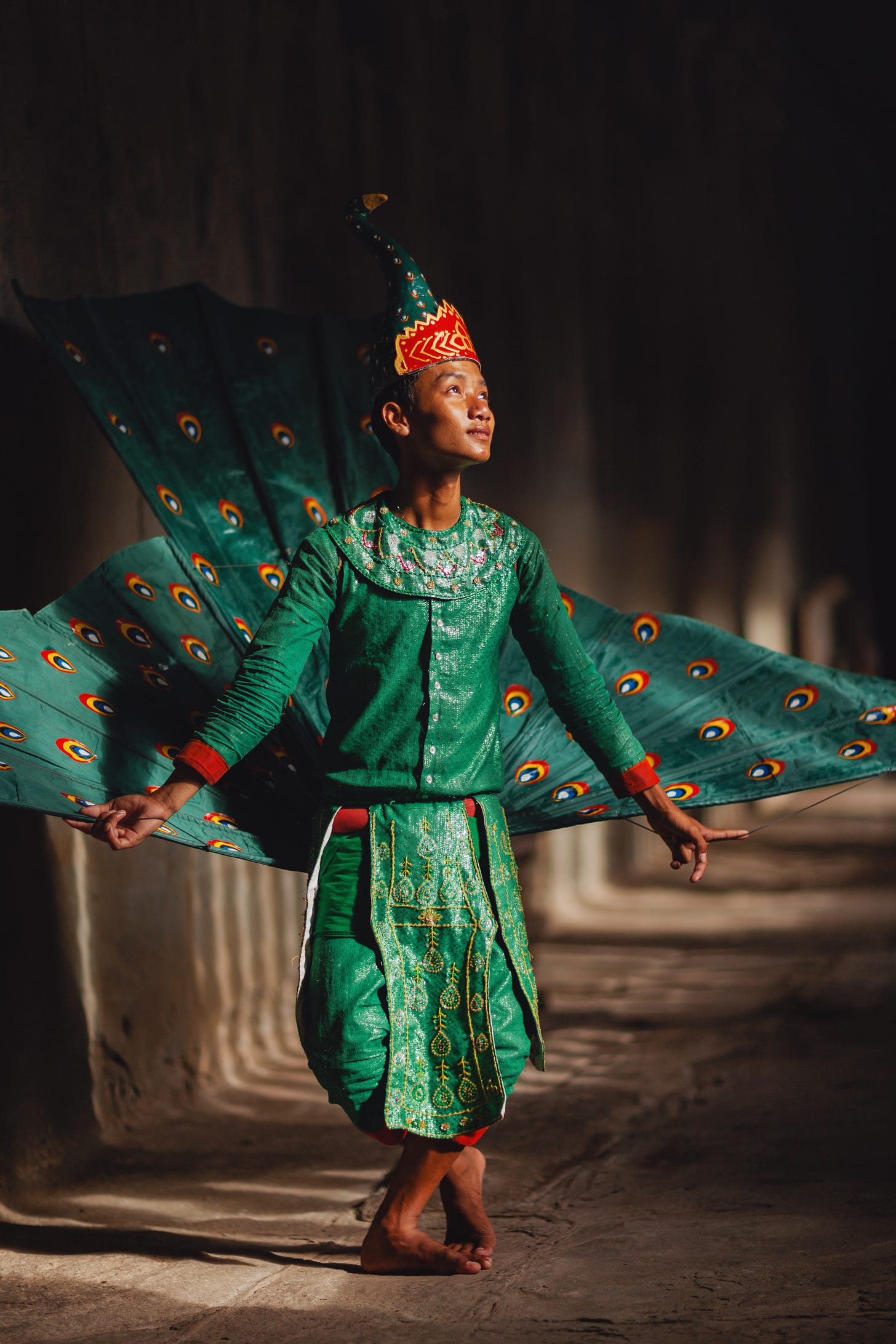 A traditional Khmer dancer wearing a peacock costume, Angkor Wat, Cambodia. 1/1250, ƒ/1.2, ISO 100, 85mm. © Gavin Gough