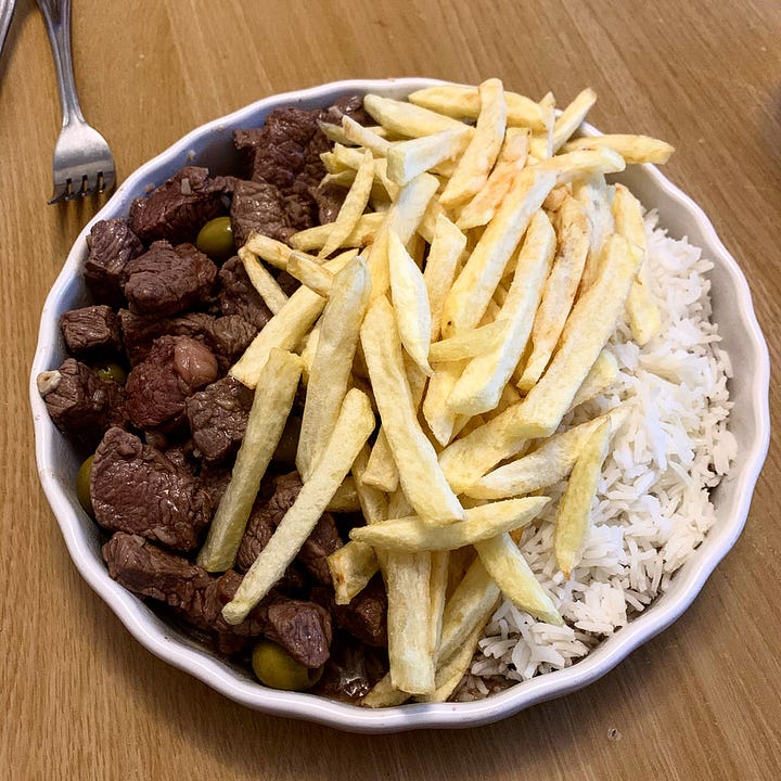 Grilled meats, flat breads and fries