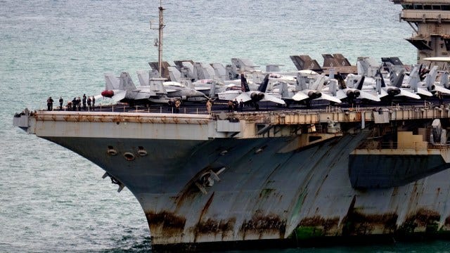 286 days at sea, 5,000 crew, and visible rust: Why observers were shocked  as USS Abraham Lincoln arrived in Thailand