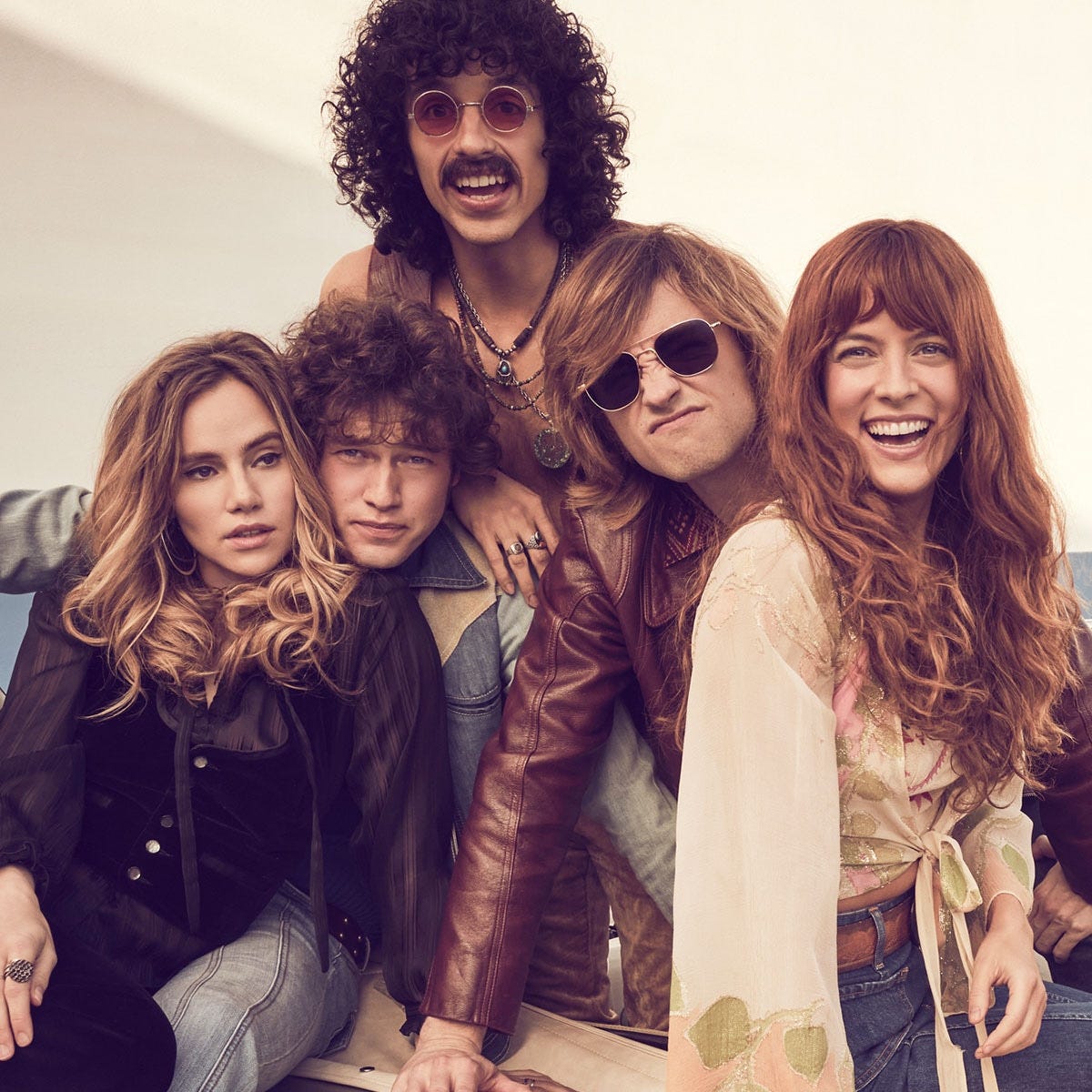 Why Daisy Jones and The Six's Male Cast Was Covered in Makeup - E! Online