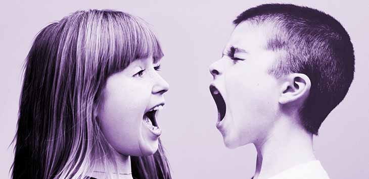 Photo of two children yelling. Photo of two children yelling.