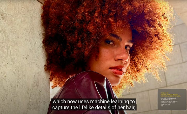 a close-up image of a woman with an afro, a stack of waffles