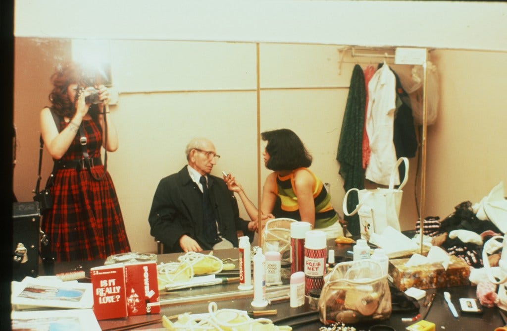 Annie photographs me chatting up the horny lingerie salesman. (photo: A. Sprinkle)