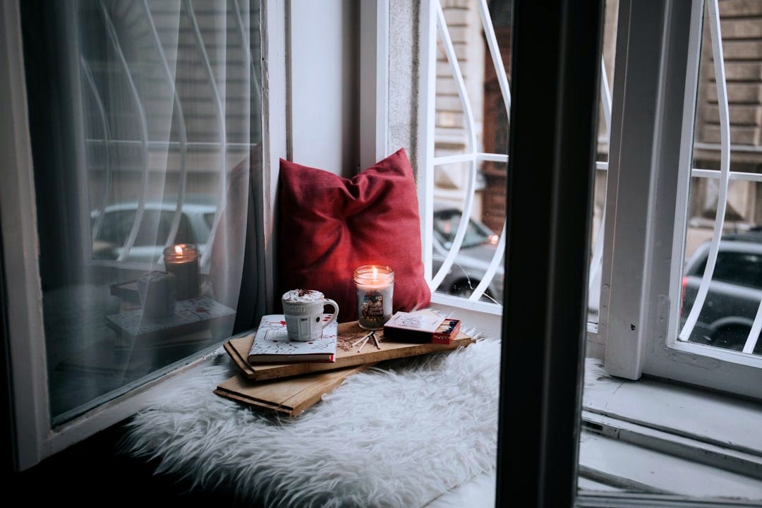 photo of gel candle on board beside pillow photo of gel candle on board beside pillow